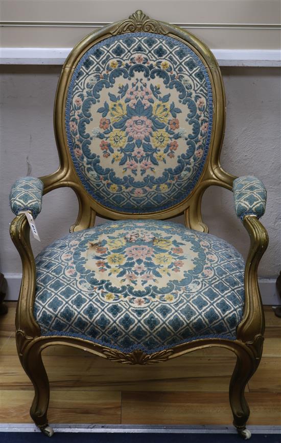 A Louis XV style giltwood fauteuil